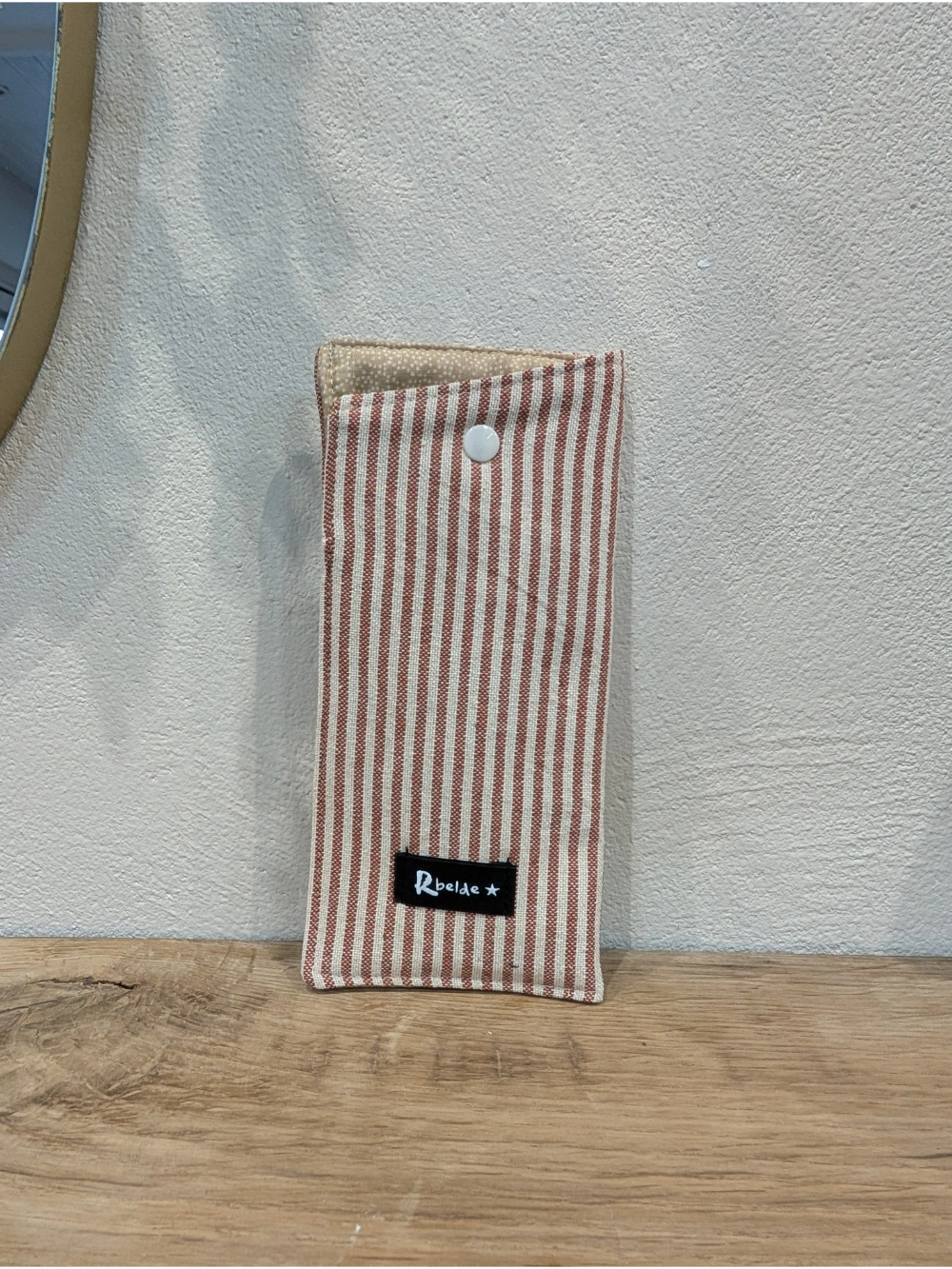 Betaurreko zorroa beix teja marraduna