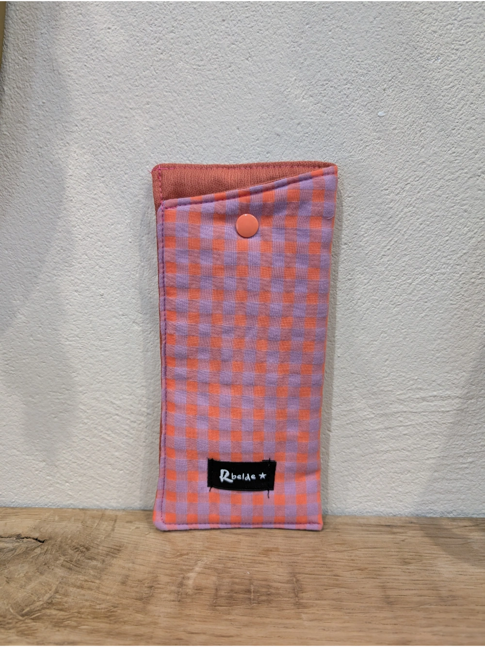 Betaurreko zorroa lila naranja