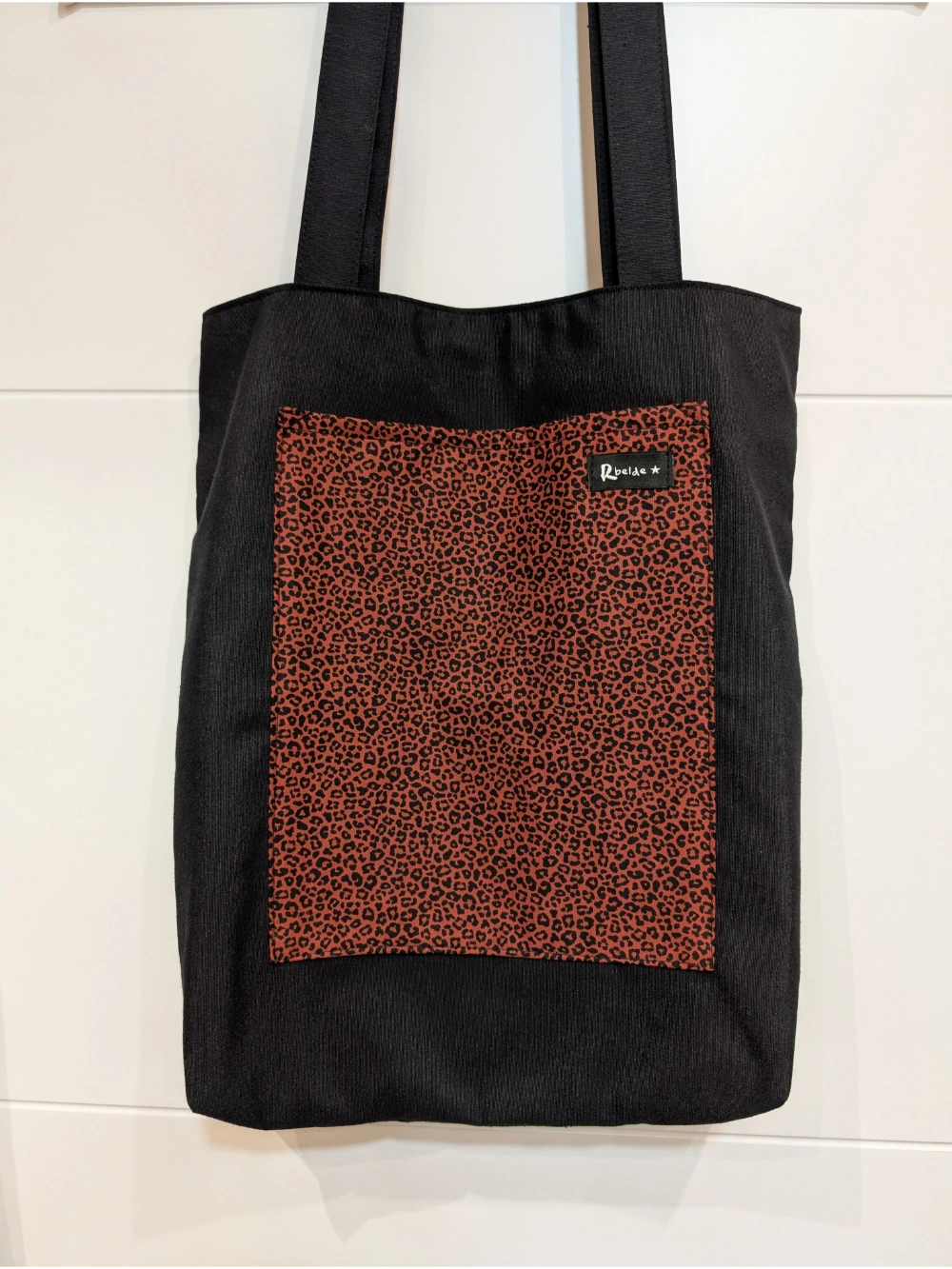 Aska loneta beltza leopardo teja