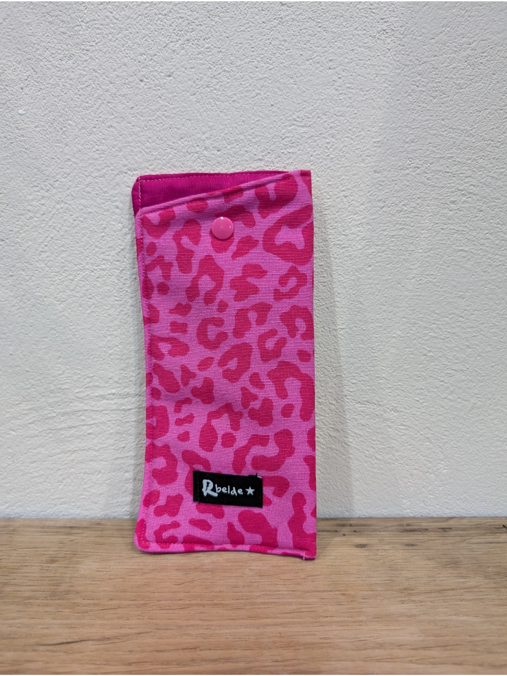 Betaurreko zorroa leopardo arrox fuksia